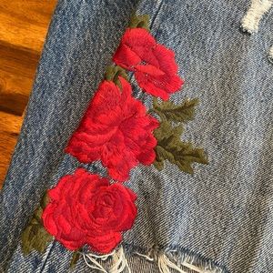 rose embroidered levi’s